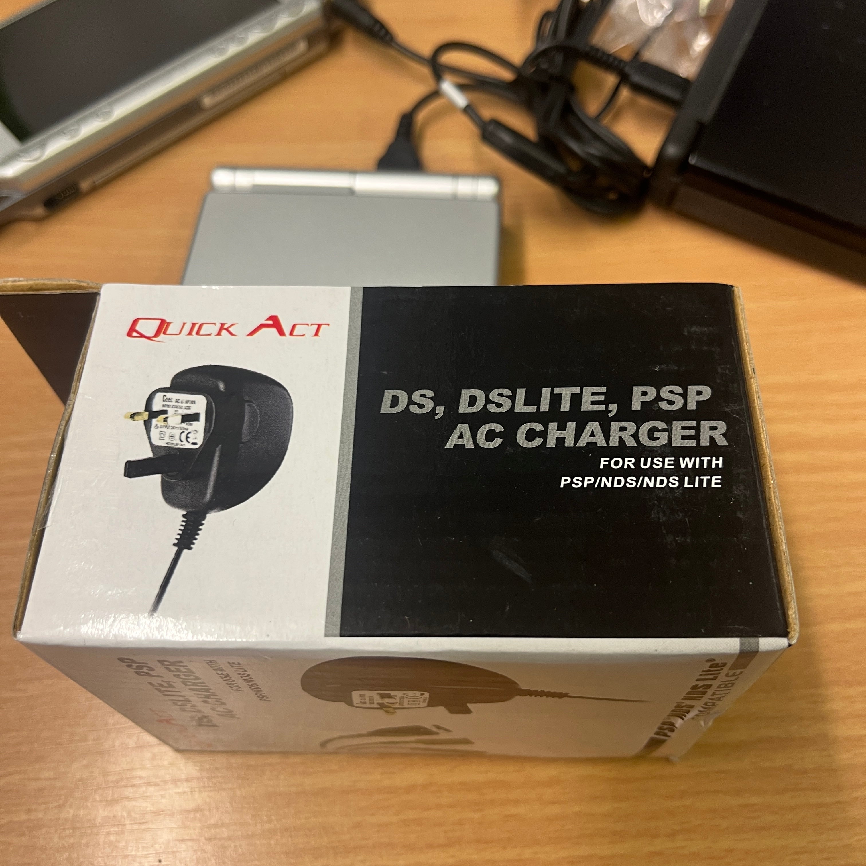 Multi Charger for Sony PSP, Nintendo DS, DS Lite, GBA SP handheld Consoles Multi Charger for Sony PSP, Nintendo DS, DS Lite, GBA SP handheld Consoles